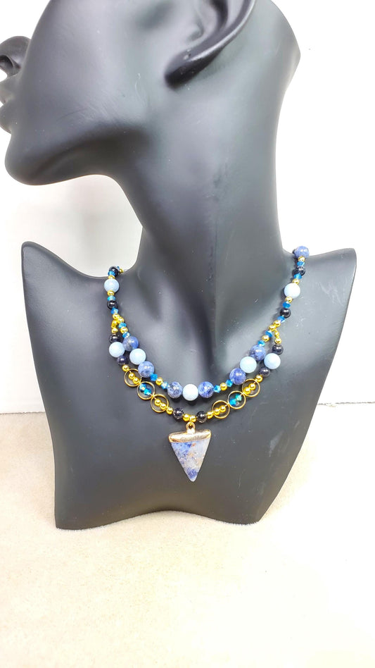 Sodalite and Agate Blue & Gold Gemstone Necklace with Agate, Sodalite, and Goldstone Beads along with a Sodalite and Brass Pendant